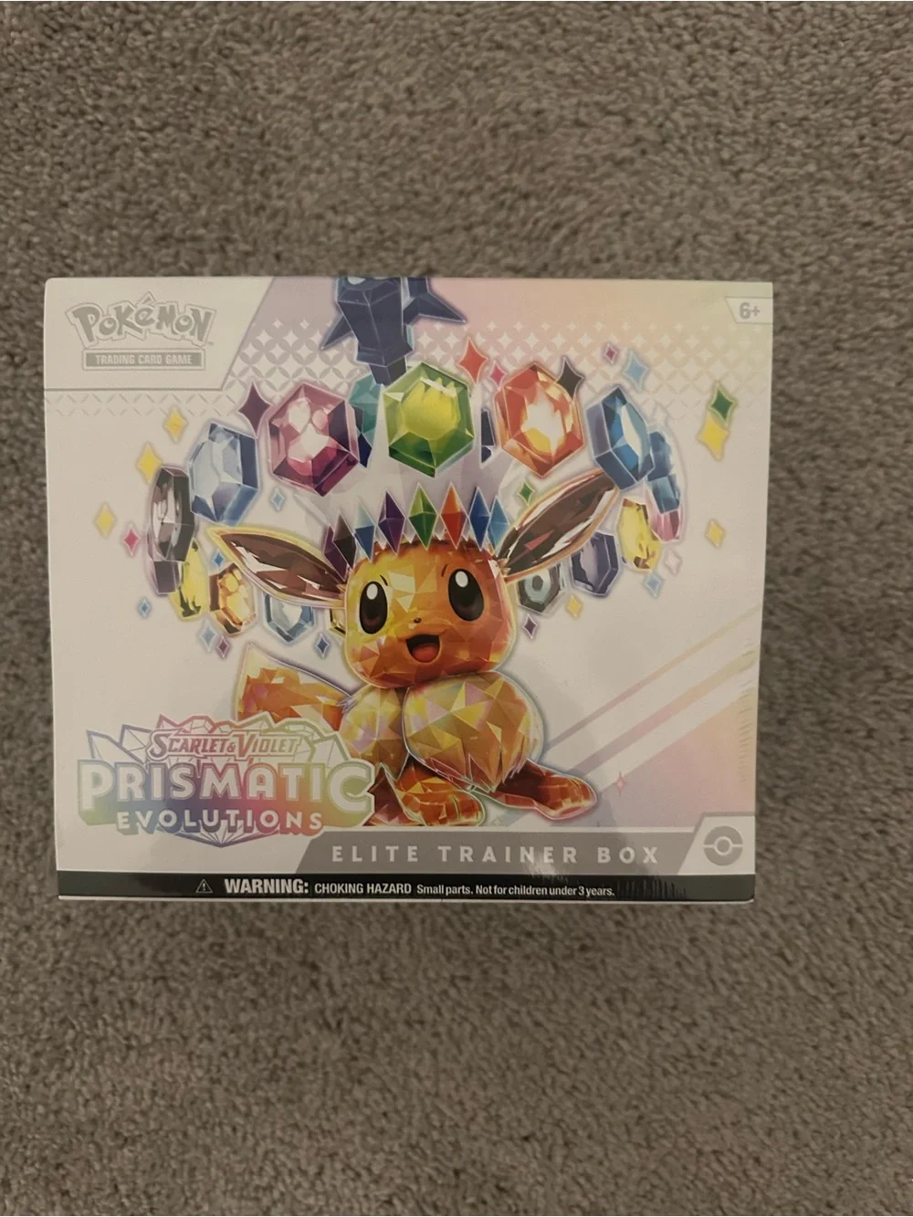 Pokémon TCG: Scarlet & Violet—Prismatic Evolutions Elite Trainer Box *SMALLTEAR*